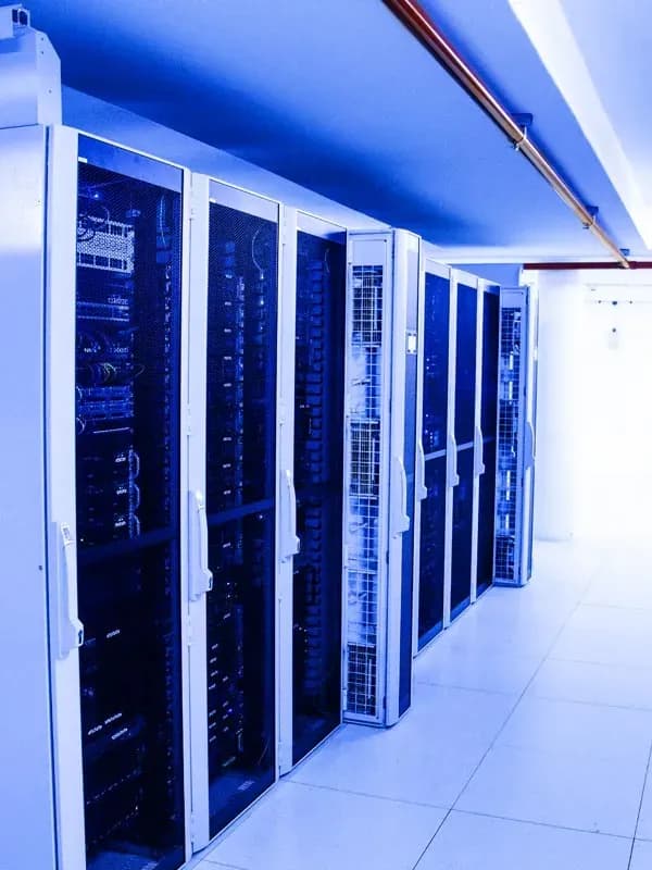 Server racks with fire suppression roof pipes
